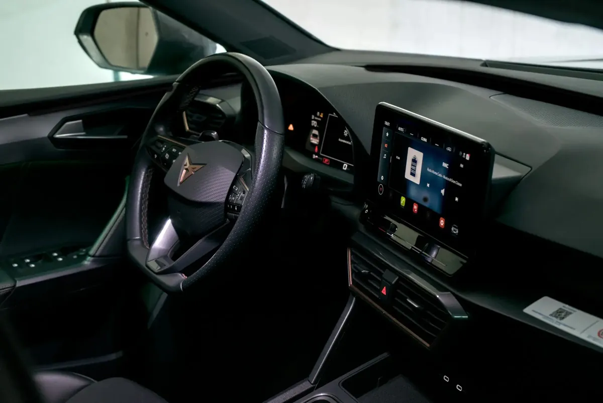 Dashboard and door panel of a car with the ambient lighting switched off