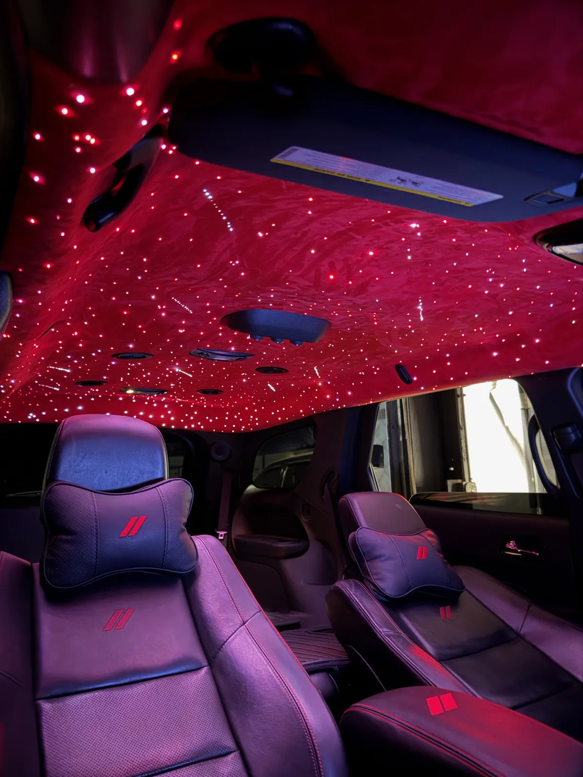 Red suede starlight headliner with shooting stars in a Dodge Durango