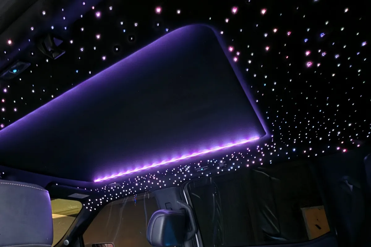 Purple sunroof strip and fiber-optic stars in a Ford F-150